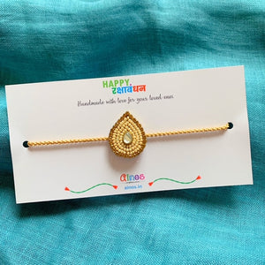 Cream Droplet Rakhi