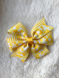 Yellow Hearts Pinwheel Bow